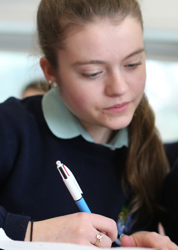 Close up of student writing