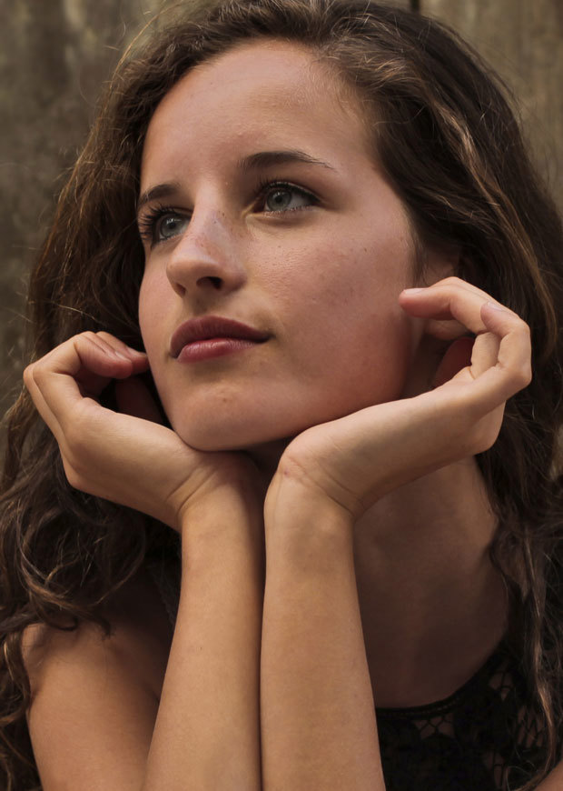 Close up of student looking pensively into the distance