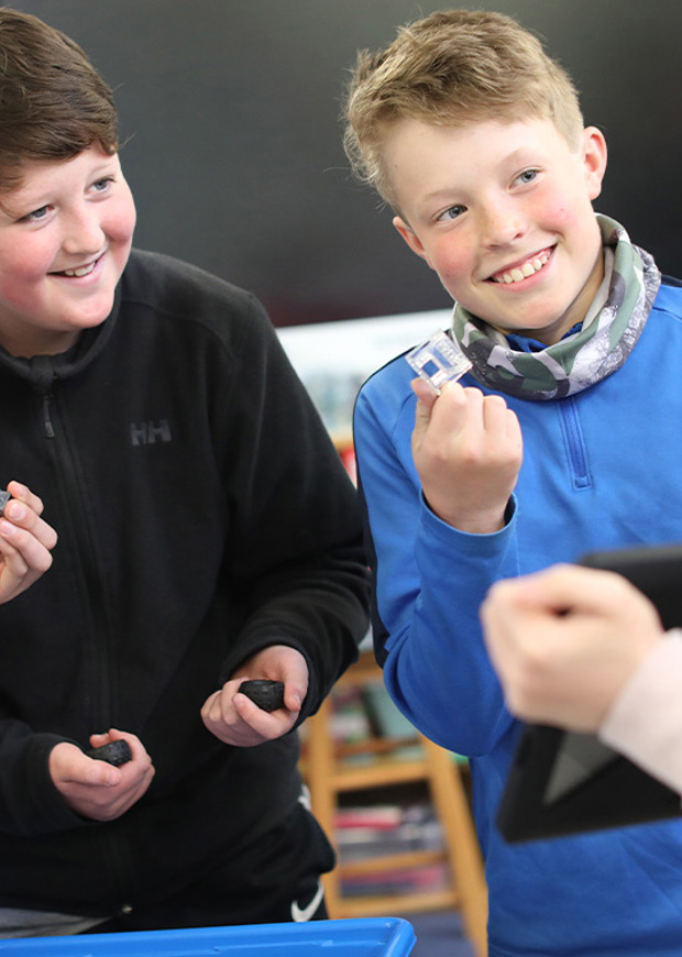 Two children smiling 