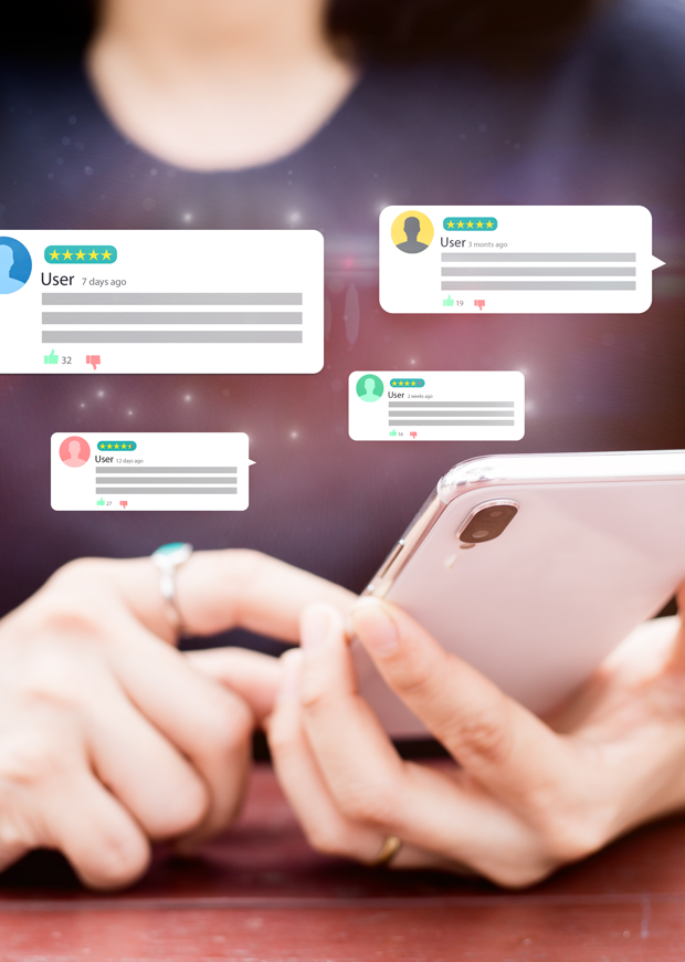 Close up of a student checking social media posts on their mobile phone